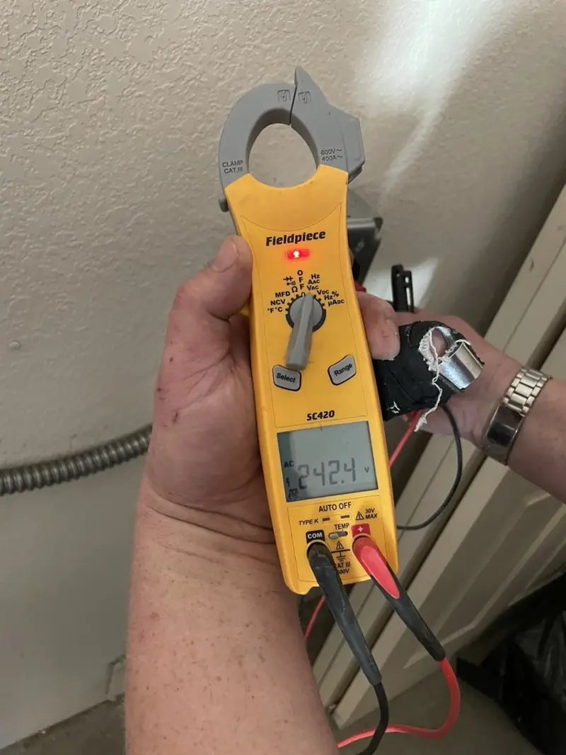 Voltage testing with clamp meter during Circuit Breaker Repair in Pottsville